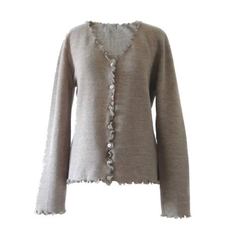 PFL knitwear, women's cardigan met ruffle hem details.