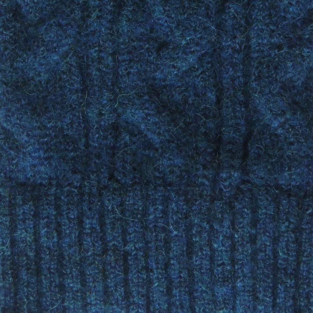 Unisex blue alpaca beanie felted with cable pattern. Unisex blue alpaca beanie felted with cable pattern.